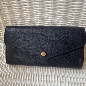 Authentic Louis Vuitton Empreinte Leather wallet